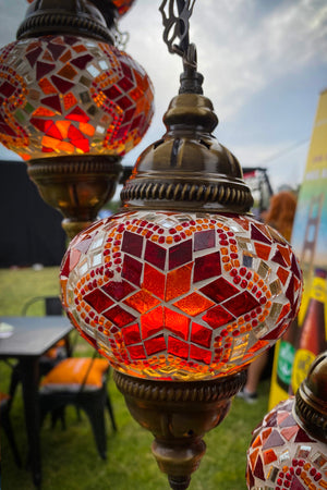 Lámpara turca colgante de 7 esferas naranjas S